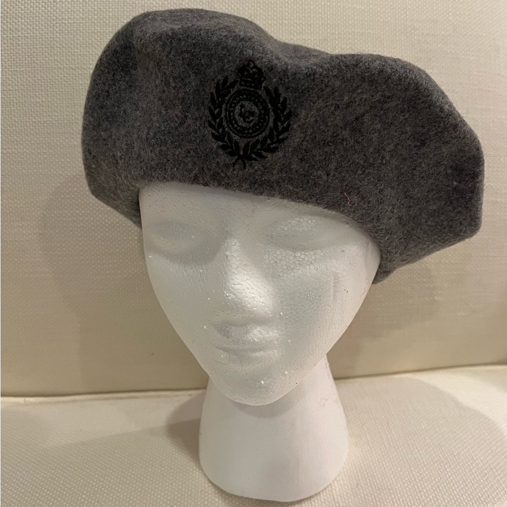 Liz Claiborne wool cap with medallion logo